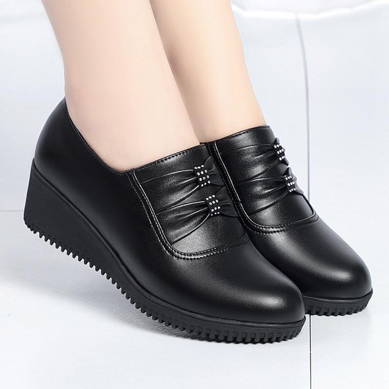 Black wedge work orders shoes