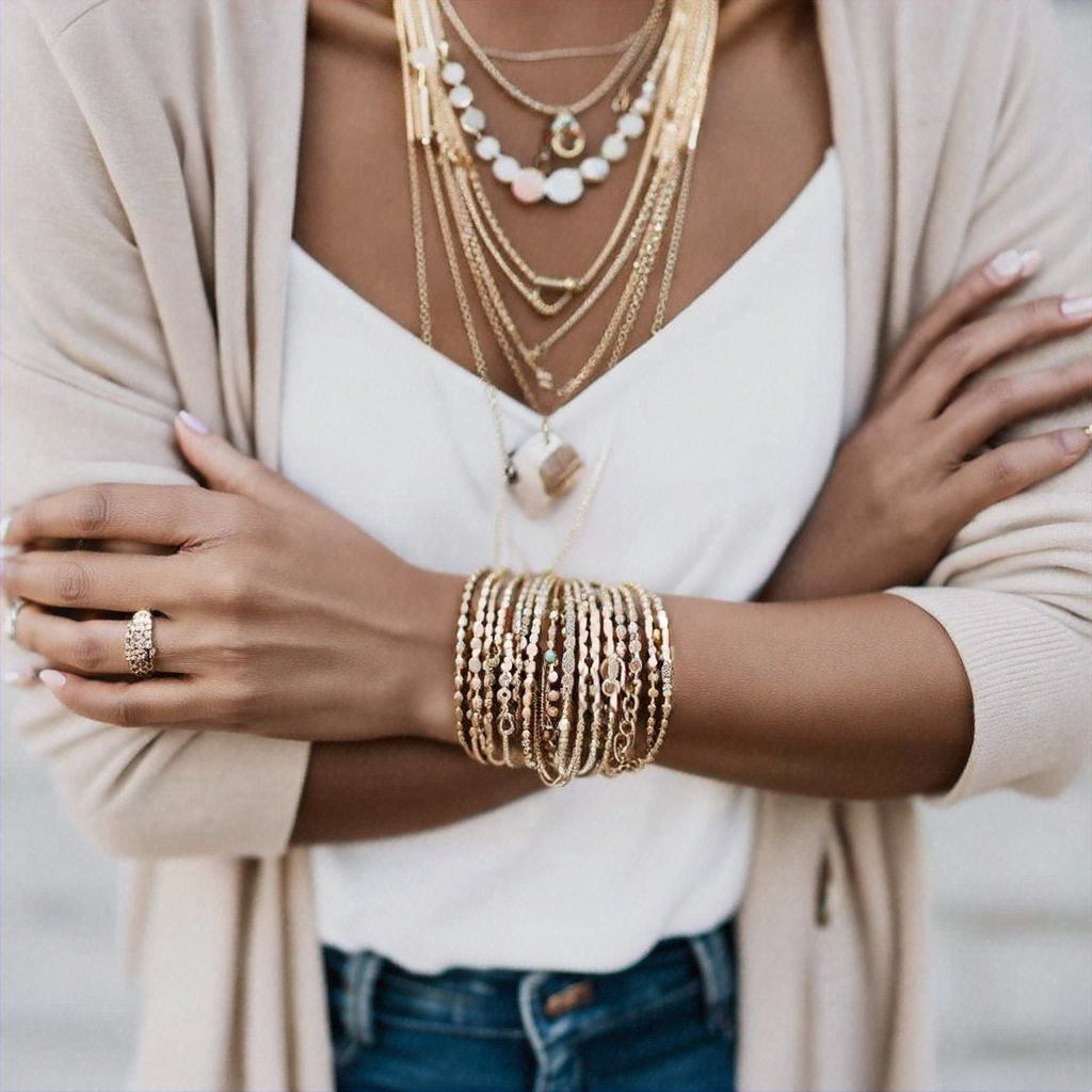 A close-up of layered necklaces and bracelets - Touchy Style