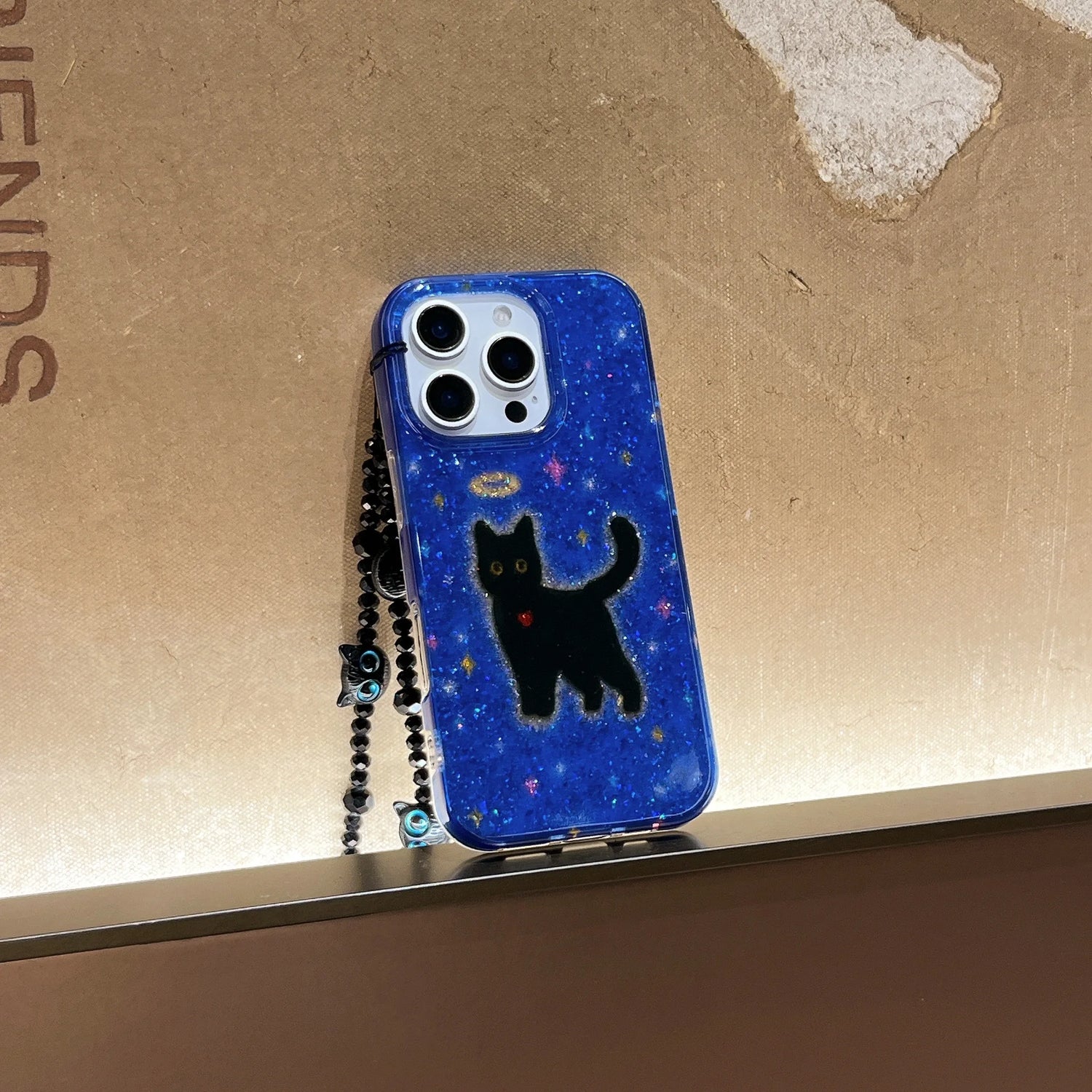 Cute Phone Cases For iPhone 16, 15, 14, 13 Pro Max - Glittering Blue Background Black Cat Pattern - Cover With Wrist Chain - PC6530