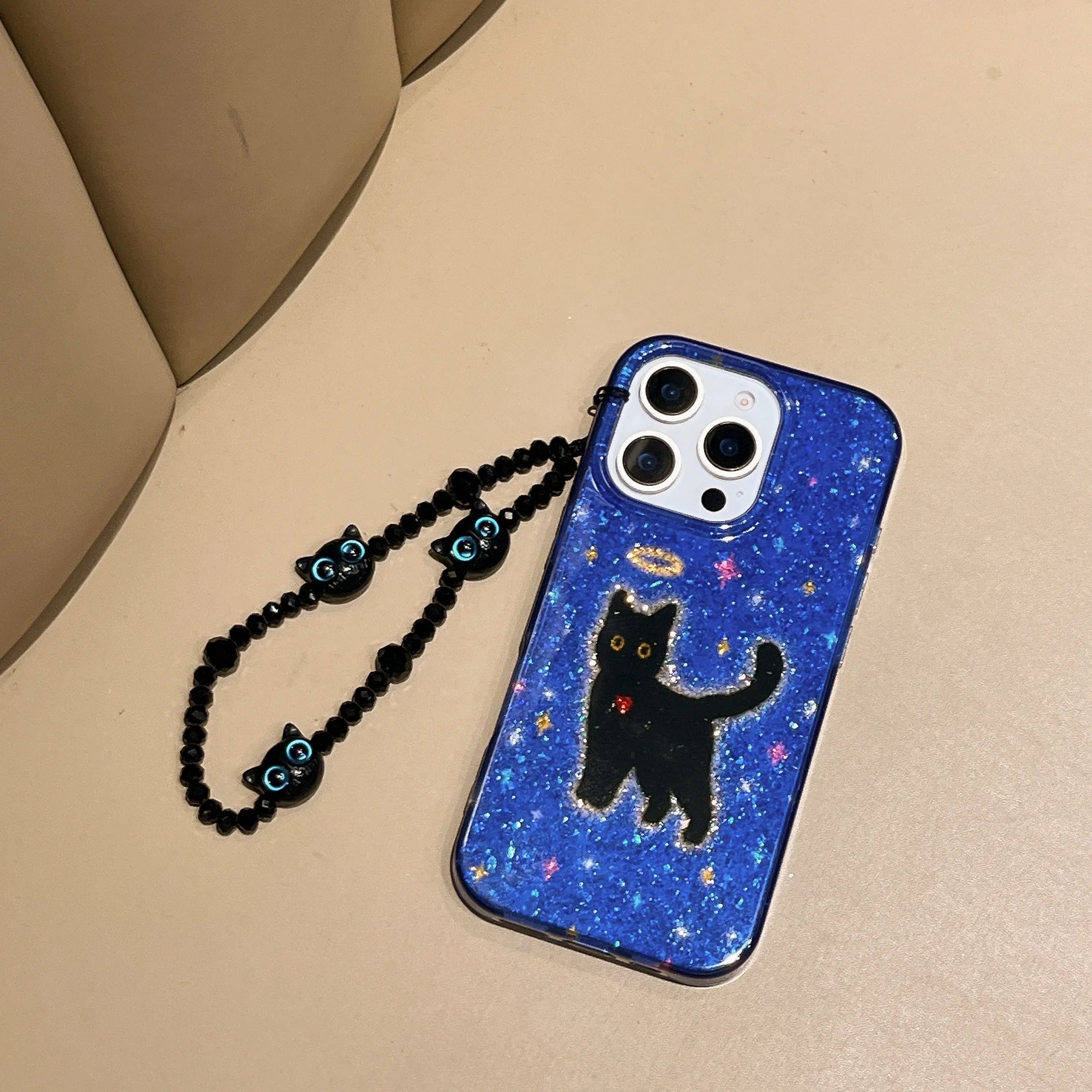 Cute Phone Cases For iPhone 16, 15, 14, 13 Pro Max - Glittering Blue Background Black Cat Pattern - Cover With Wrist Chain - PC6530