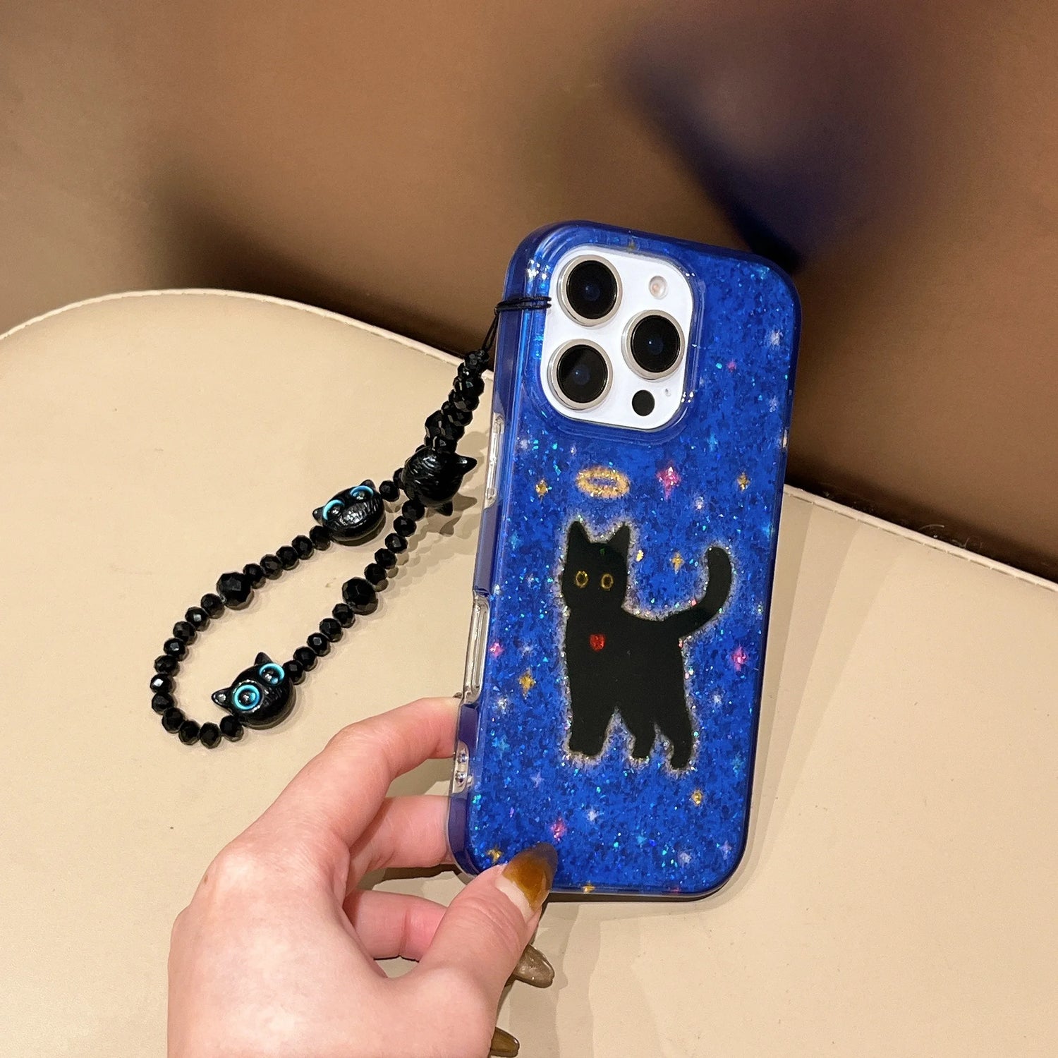 Cute Phone Cases For iPhone 16, 15, 14, 13 Pro Max - Glittering Blue Background Black Cat Pattern - Cover With Wrist Chain - PC6530