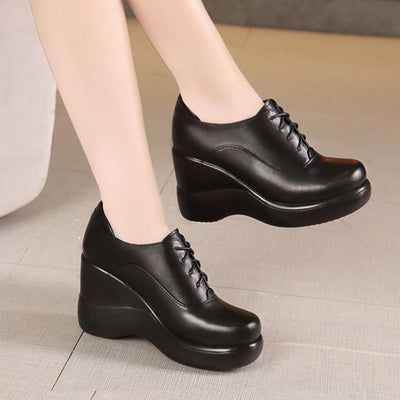 Black wedge heel outlet pumps